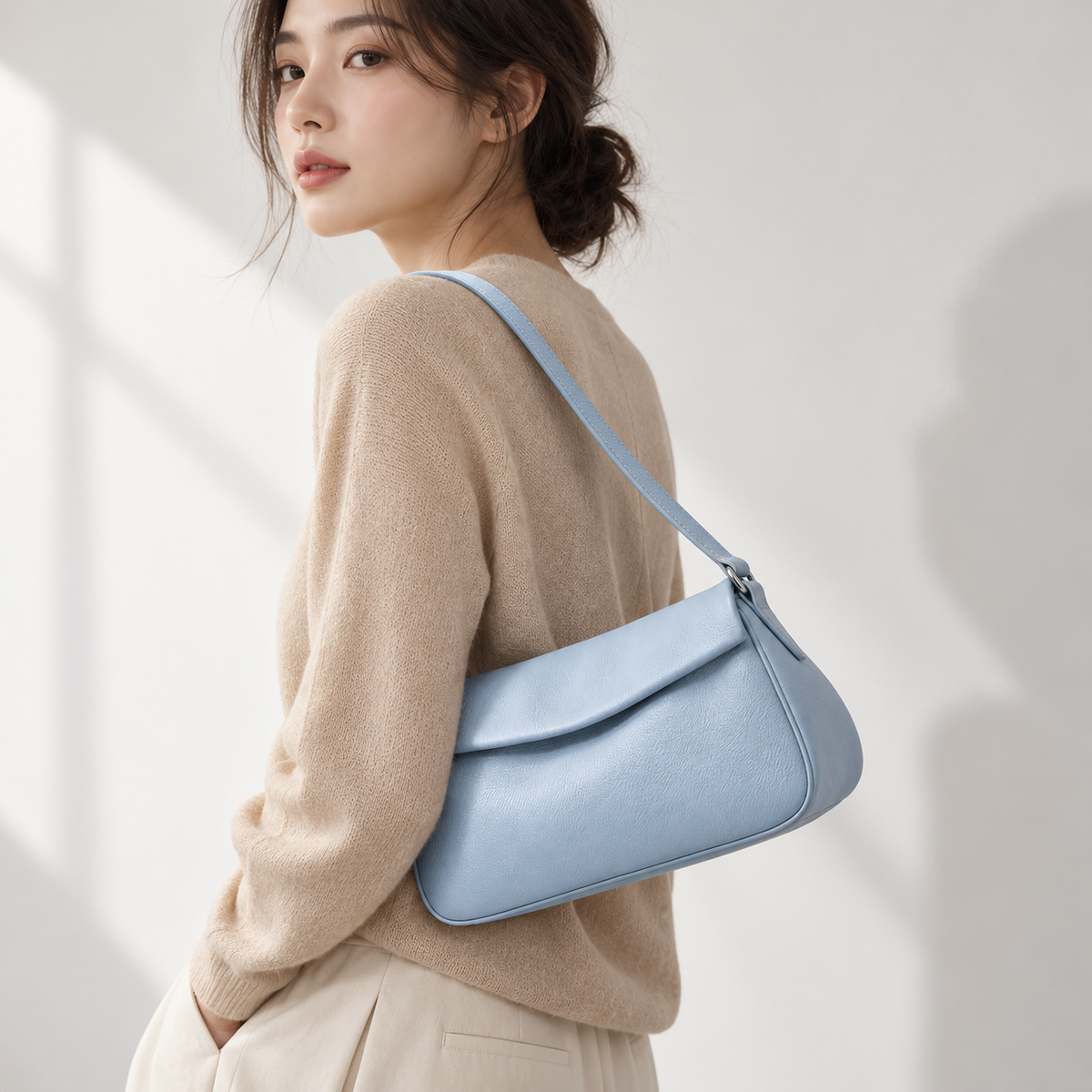 Lune Fold Shoulder Bag in Powder Blue — lifestyle view