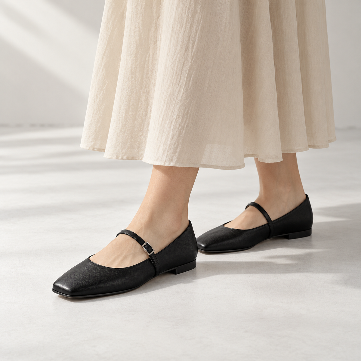 Mira Square-Toe Flat in Black — lifestyle view