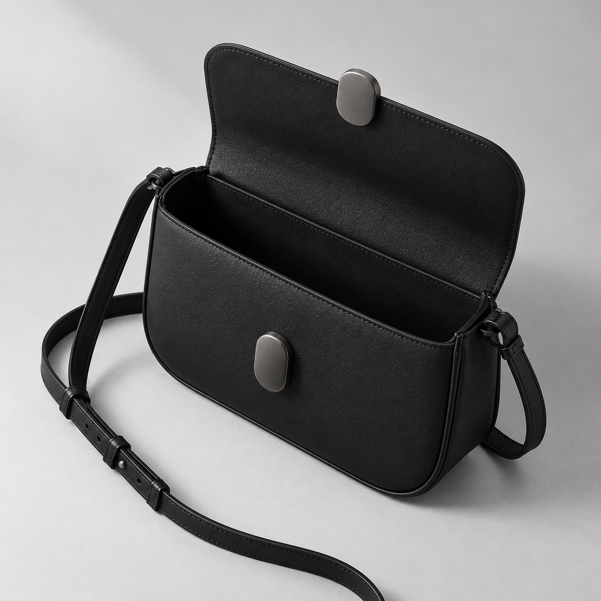 Romy Frame Crossbody in Black — construction view